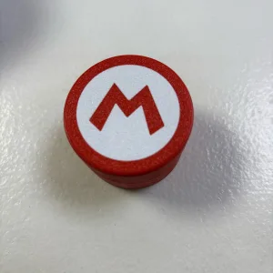 Caja redonda para guardar juegos de Nintendo Switch con diseño de Super Mario.